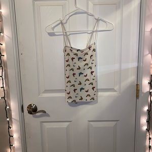 Y2K white butterfly tank best fits a small or medium